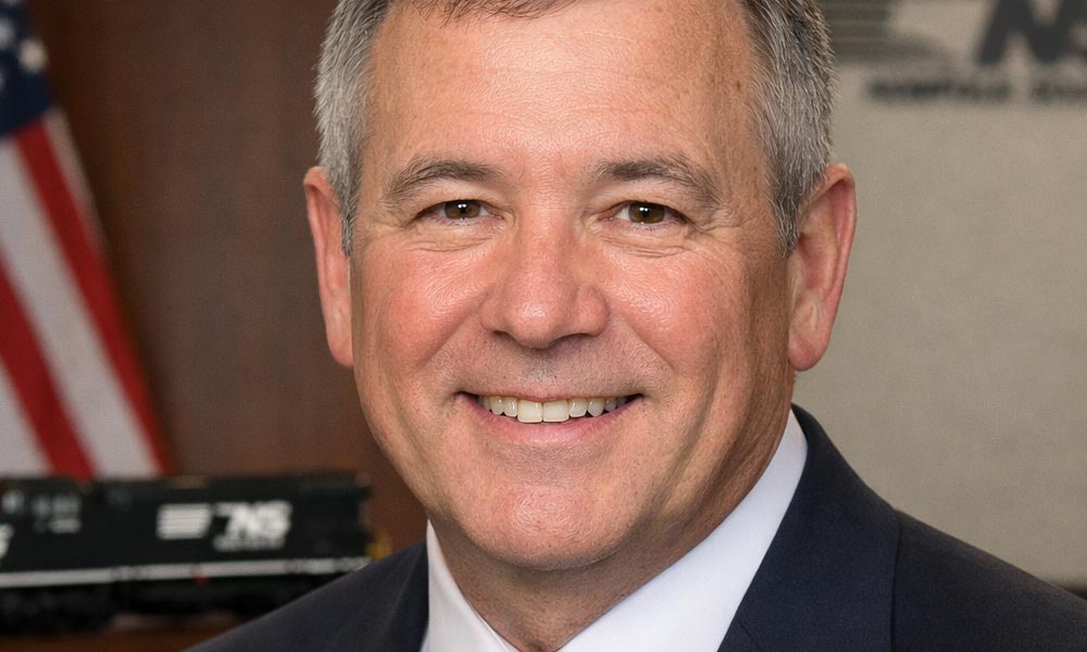 Claude Edward Elkins Jr: From Brakeman to Top Executive