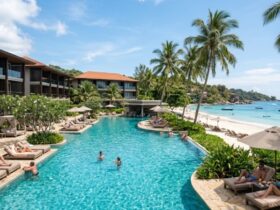 Couple planning cheap holidays at a modern hotel